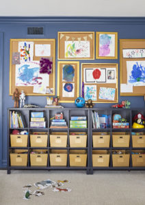 storage boxes in a kid's playroom
