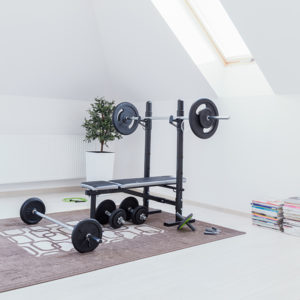 exercise bench in an attic