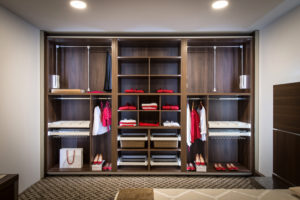 Built in closet with warderobe in home interior