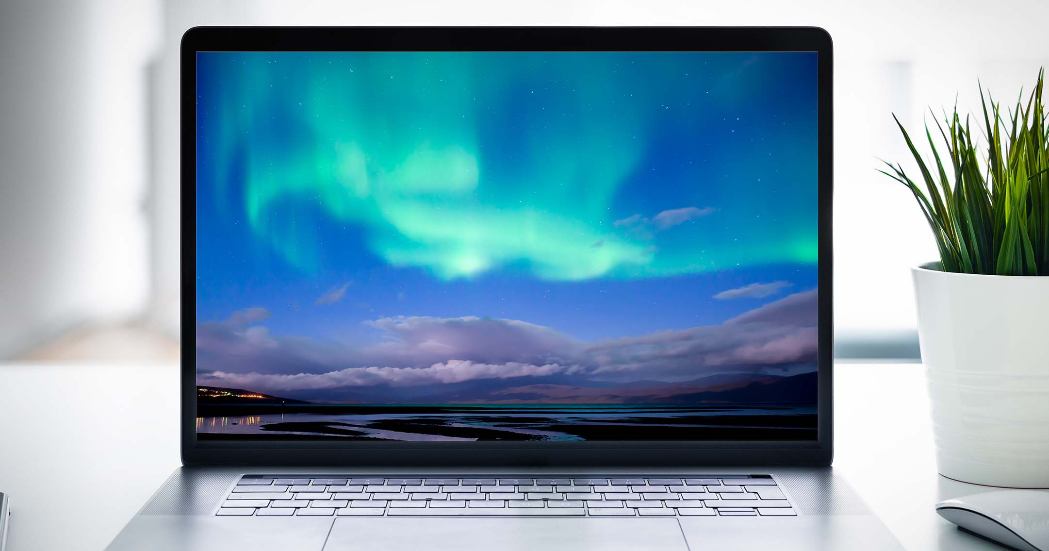 laptop screen with landscape